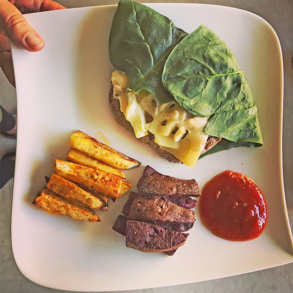 Maddywell’s grassfed beef burger wrapped in spinach leaves and topped with cheese & truffle mayo (definitely not vegan nor healthy but you can leave those out!) sweet potato fries and Natura’s ketchup
