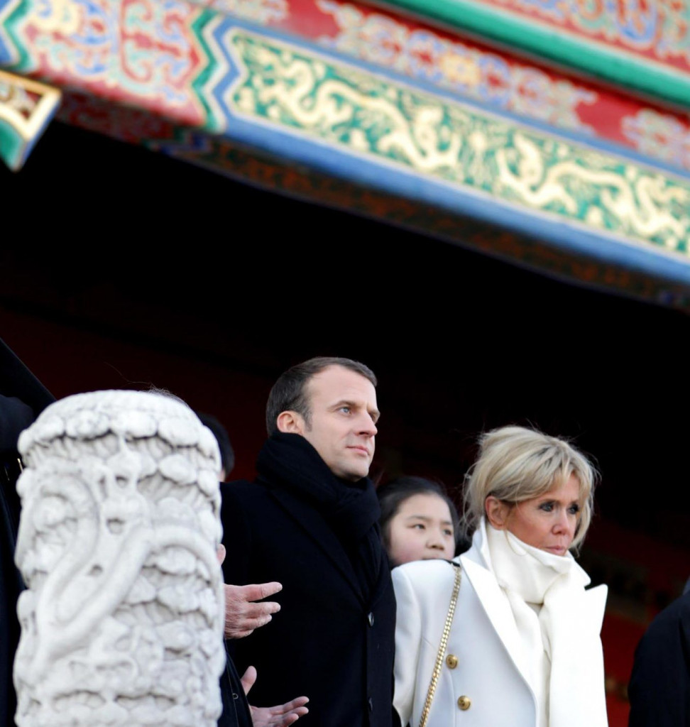 Emmanuel and Brigitte Macron in China. Photo: Facebook Emmanuel Macron