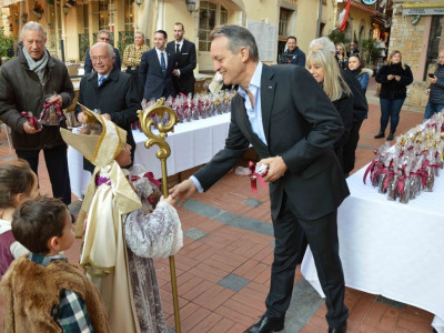 Children receive Saint Nicholas chocolates