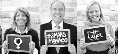 Prince Albert holding a sign with others as part of the campaign