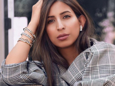 Lady wearing APM Monaco jewellery