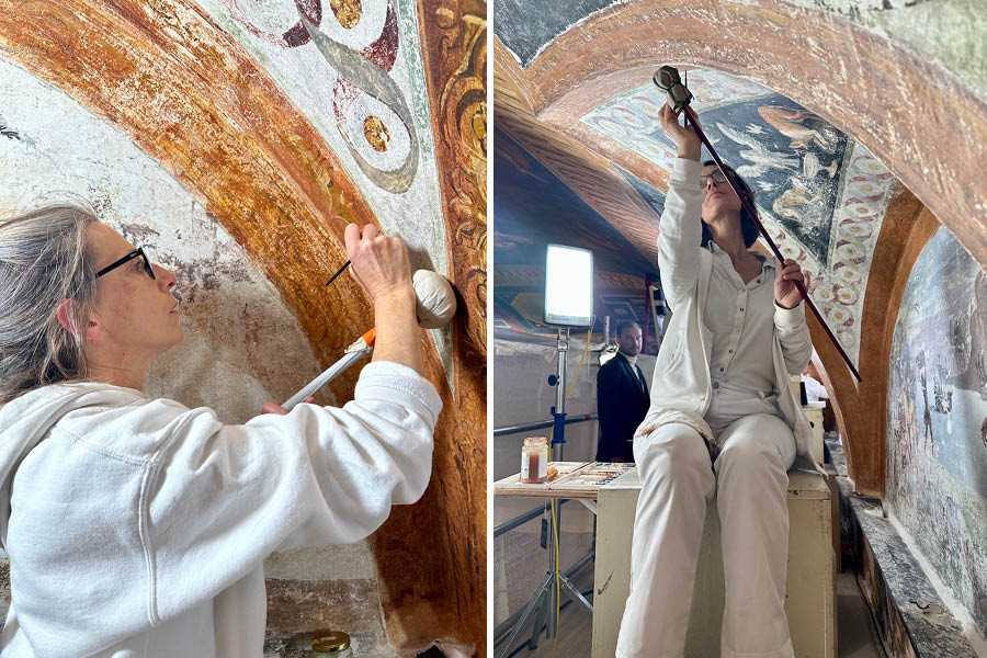 restorers work on frescos in the Prince's Palace