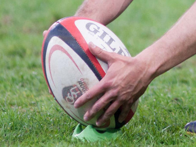 Gilbert Rugby Ball being placed for a penalty