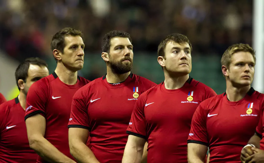 Nathan Jones (far right) playing for the national rugby team
