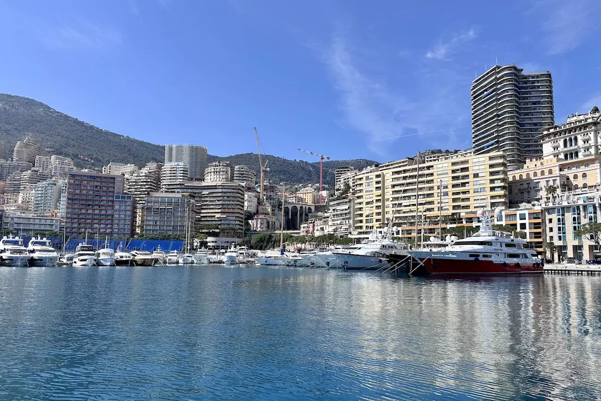 A wide shot of Monaco bordering the Mediterranean Sea 