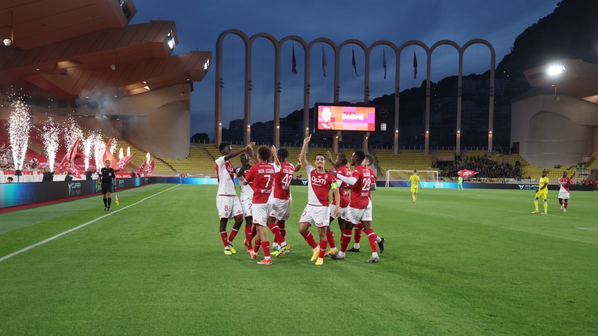 AS Monaco players celebrate during their 4-0 victory over Nantes in front of the iconic arches of the Stade Louis II