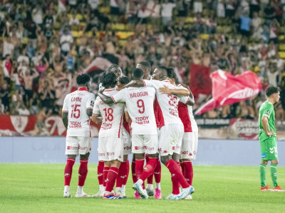 Monaco's players celebrate after Takumi Minamino's strike is awarded as a goal after a lengthy VAR check.