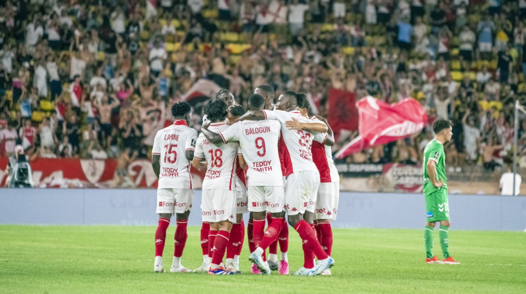 Monaco's players celebrate after Takumi Minamino's strike is awarded as a goal after a lengthy VAR check.