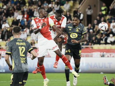 Singo and Zakaria rise to try and win a header during Monaco's 0-0 draw against Lille