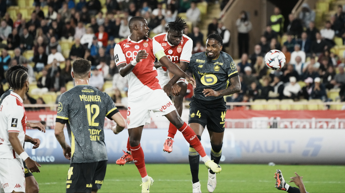 Singo and Zakaria rise to try and win a header during Monaco's 0-0 draw against Lille