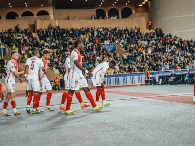 AS Monaco players walking around the track around the Stade Louis II during the defeat to Benfica.