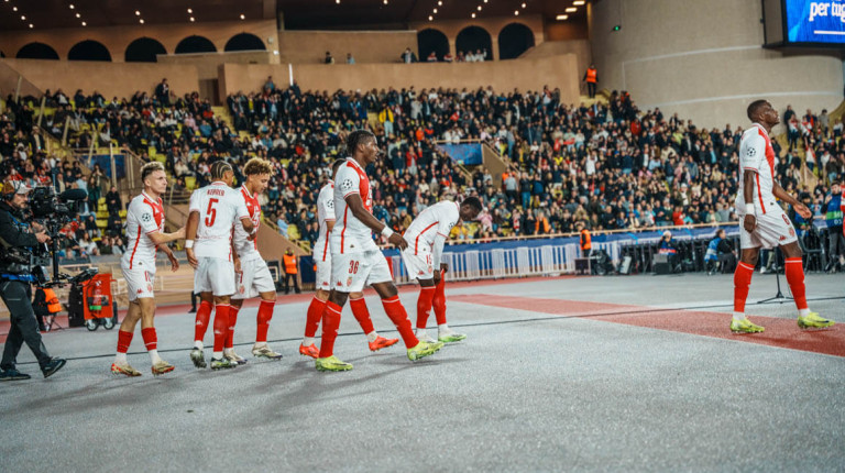 AS Monaco players walking around the track around the Stade Louis II during the defeat to Benfica.