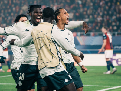 Thilo Kehrer celebrates his match winner in front of the travelling fans during Monaco's win over Bologna