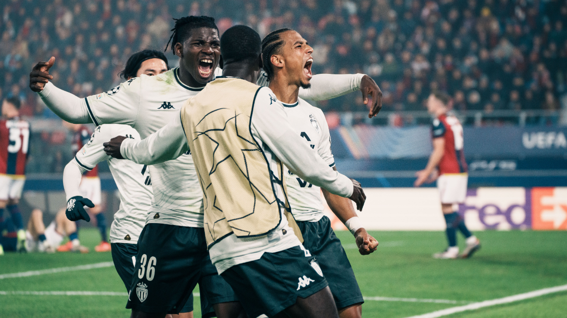 Thilo Kehrer celebrates his match winner in front of the travelling fans during Monaco's win over Bologna