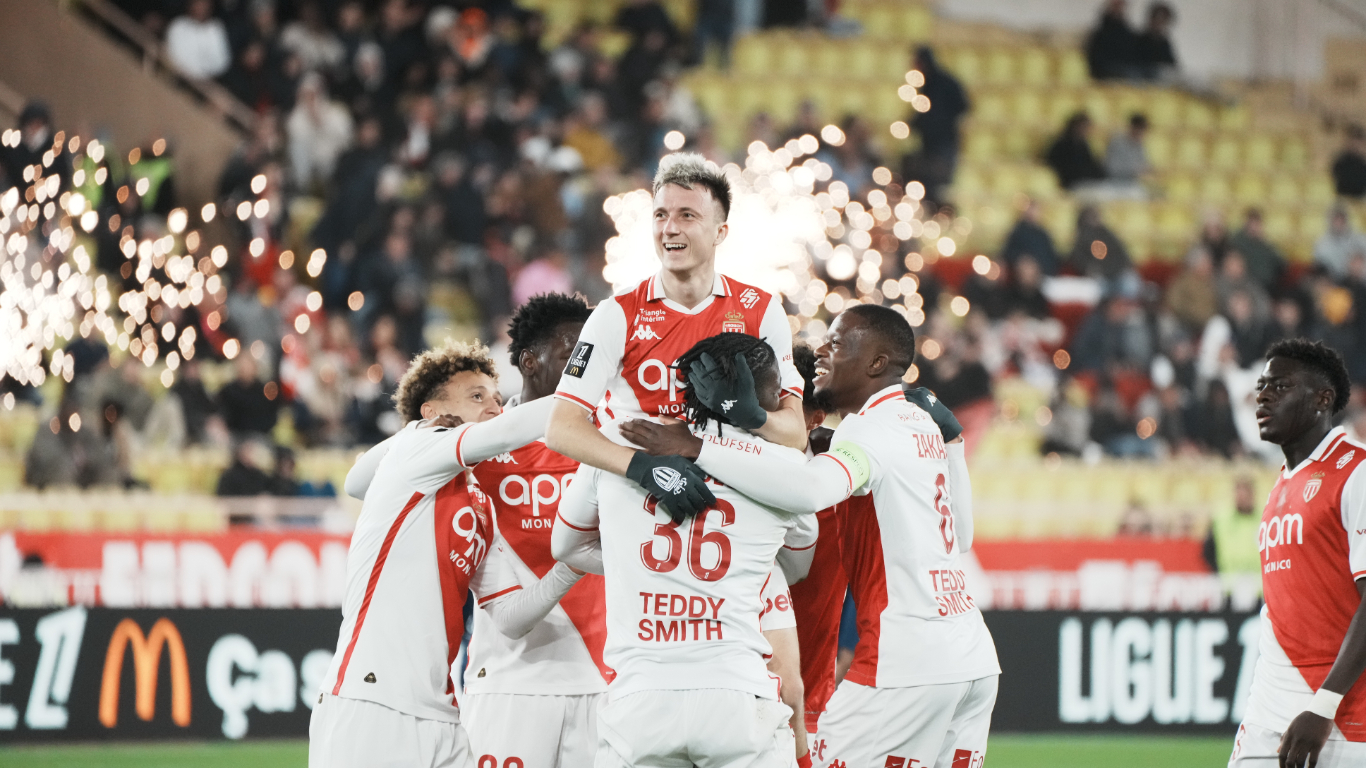 Golovin is held aloft by his teammates after scoring in Monaco's win over Brest at the Stade Louis II.