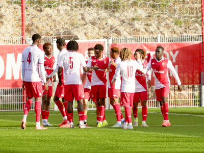 Monaco's academy celebrate Lucas Michal's winner against Benfica at the club's Performance Centre in La Turbie