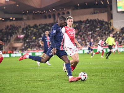 Dembélé swinging a ball into the box at the Stade Louis II during PSG's 4-2 win against Monaco