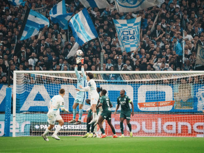 Majecki rising highest in a crowded box to claim the ball in Monaco's defeat to Marseille at the Vélodrome