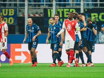 Inter Milan's celebrate behind Denis Zakaria as Monaco fall behind at the San Siro