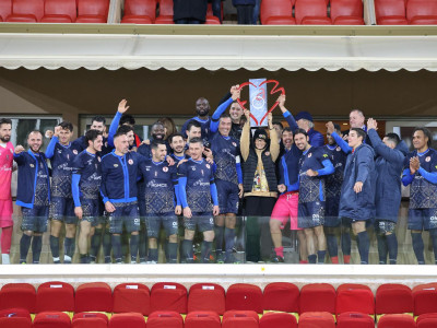 Cirque FC lift the Fight AIDS Cup at the Stade Louis II