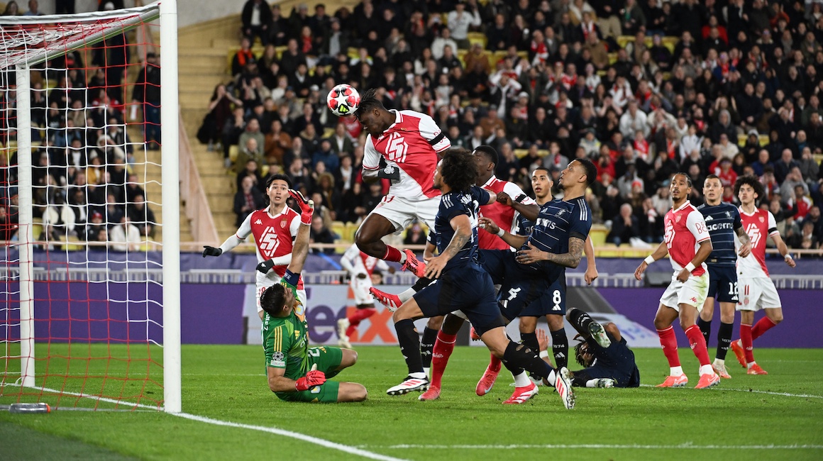 Singo heads home past Aston Villa goalkeeper Martinez to give Monaco the lead at the Stade Louis II