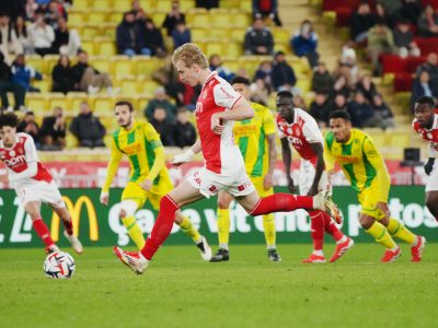 Mika Biereth stepping up to convert his penalty against Nantes at the Stade Louis II