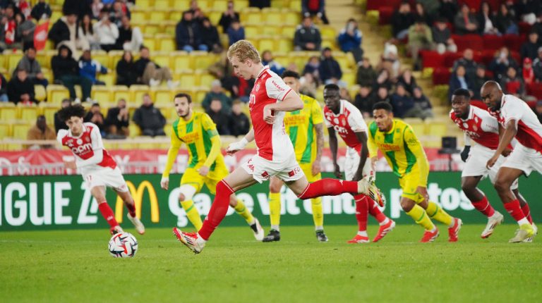 Mika Biereth stepping up to convert his penalty against Nantes at the Stade Louis II