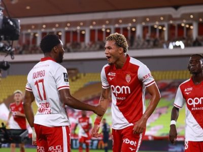 A beaming Brunner celebrates his goal with Monaco teammate Idumbo