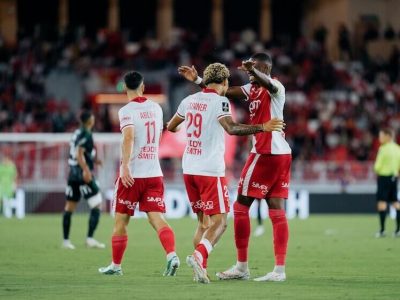 Brunner and Zakaria share a celebration after the former netted against Lens at the Stade Louis II