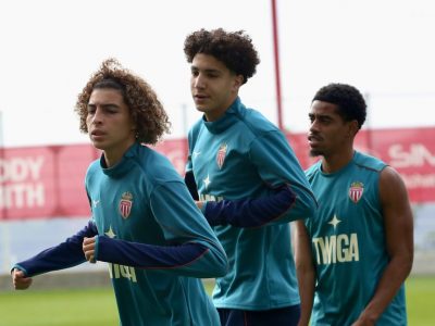 Three Monaco academy products, Soubeir, Benzahra, and Touré, in training with the first-team on a cloudy day in La Turbie